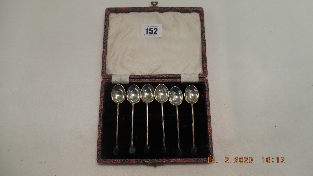 A boxed set of hallmarked silver coffee bean spoons