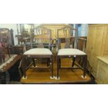 A set of eight mahogany dining chairs