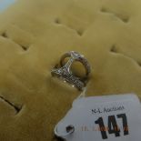 A 14ct white gold and diamond ring size I