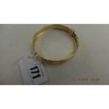An 18ct gold bangle bracelet,