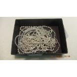 Three silver bead necklaces and eight bracelets