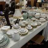 A Rosenthal porcelain dinner set with gilt rim