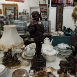 A bronze girl with basket