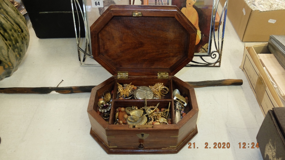 An inlaid jewellery box with jewellery items