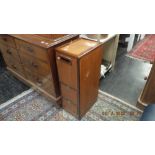 A mid century teak bar unit