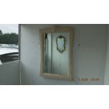 A travertine mirror