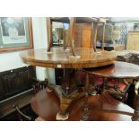 A 19th century rosewood breakfast table