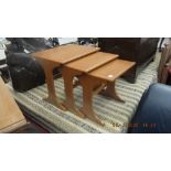 A teak nest of tables