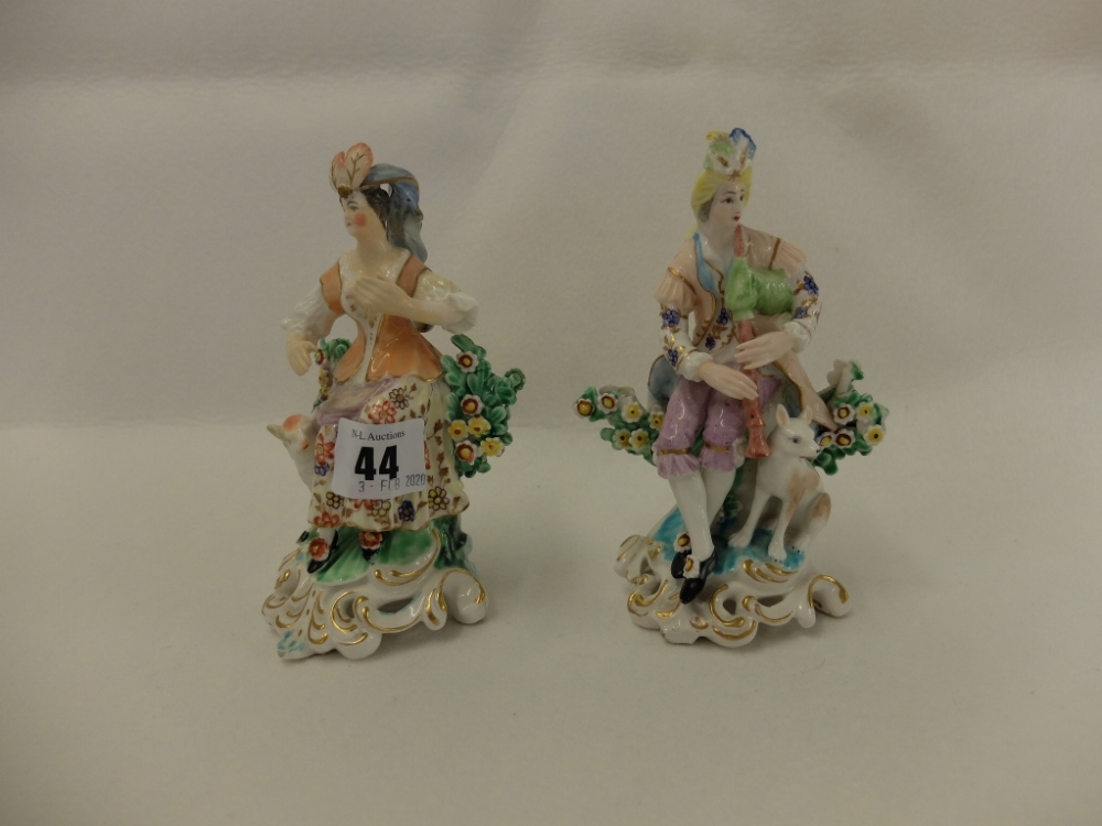 A pair of hand painted porcelain figures a/f