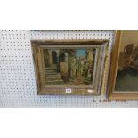 A small framed oil on canvas Spanish street scene signed lower left hand corner