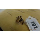 A yellow metal and sapphire ring weight 7 grams size L