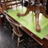 A large mahogany leather top desk