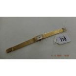 A vintage ladies 18ct gold Certina bracelet watch,