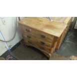 A small oak chest of three drawers