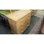 A pine chest of five drawers