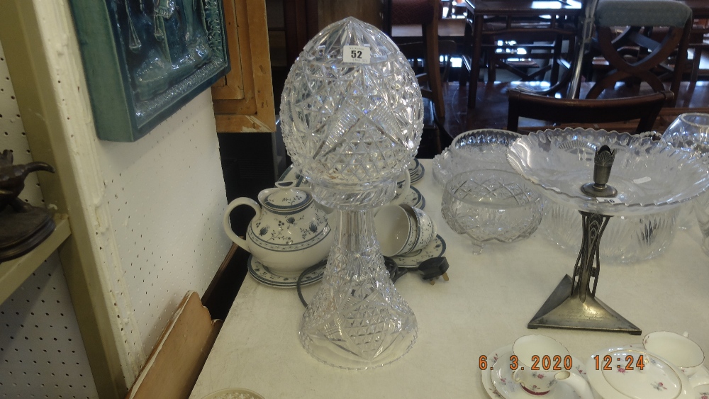 A cut crystal table lamp with crystal shades