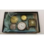 Four assorted watches and a small fob watch.