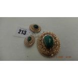 A stone set 20th century brooch/pendant green jasper and seed pearl set pendant/brooch.