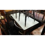 A vintage enamel top kitchen table