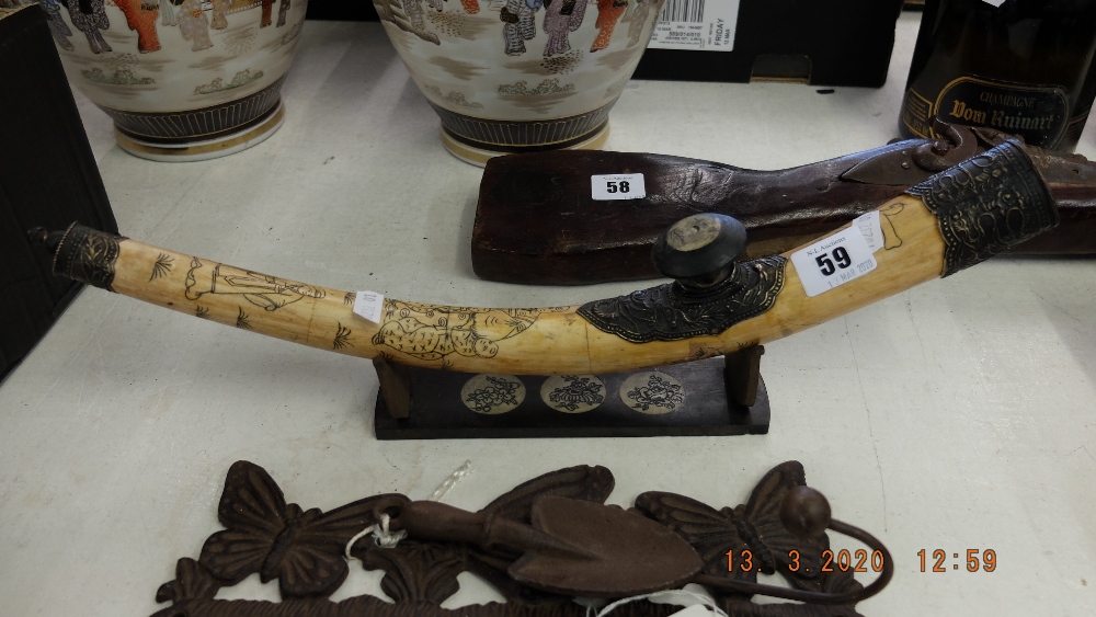 A vintage bone opium pipe on stand - Image 2 of 2
