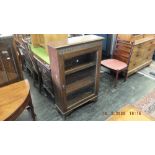 A glazed oak bookcase