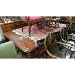 A 19th century mahogany extending dining table