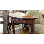 A 19th century mahogany demi lune table
