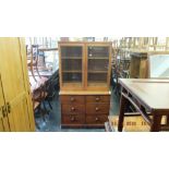 A Victorian mahogany bookcase on chest base