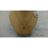 A 9ct white gold and citrine pendant and chain weight 2 grams