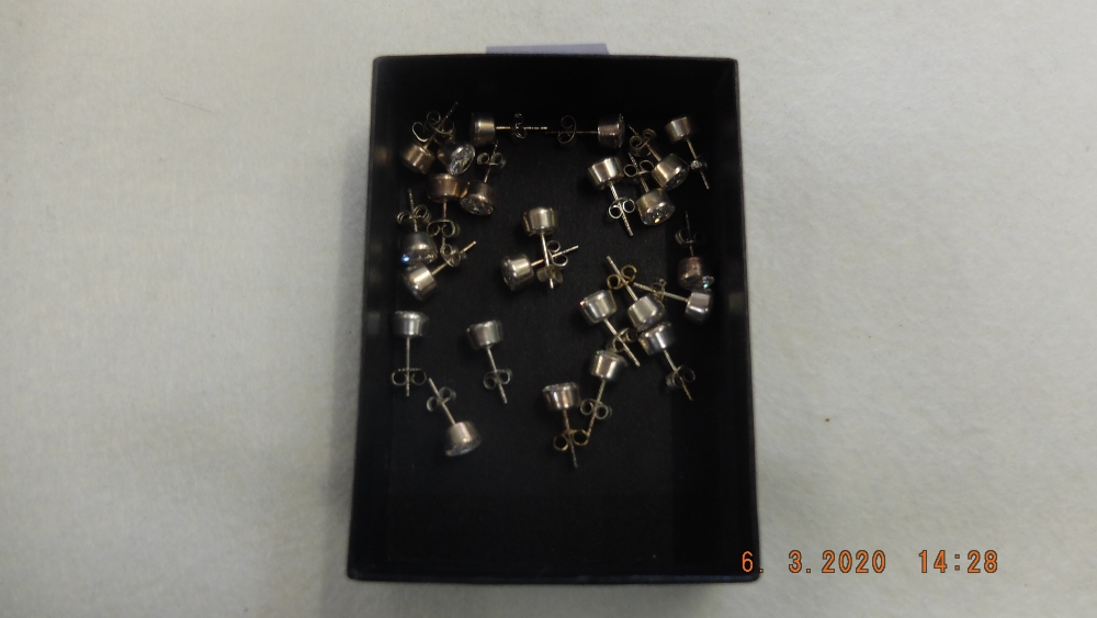 Twelve assorted pairs of silver cubic zircon earrings