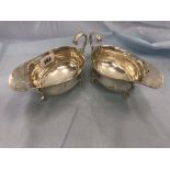 A pair of hm silver gravy boats,