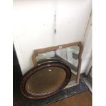 An oval mahogany mirror and another