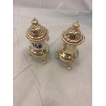 A set of hm silver salt and pepper pots,