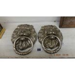 Two lion door knockers