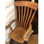 A Windsor slat back elbow chair
