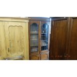 An oak leaded bookcase