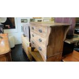 A small oak chest of three drawers