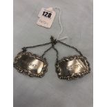 Two hallmarked silver labels,