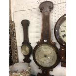 A large mahogany barometer,