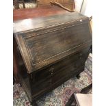 An oak bureau,