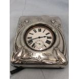 An art nouveau silver clock,