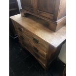 An oak two door cupboard