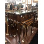 A mahogany serpentine sideboard