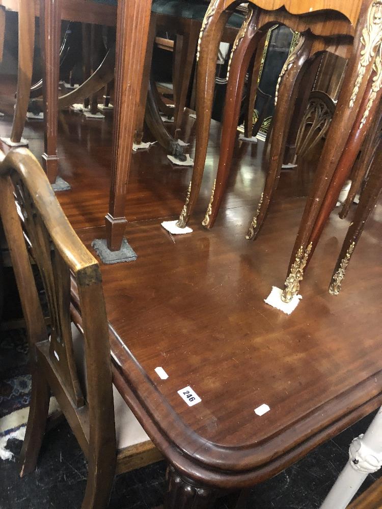 A 19th century mahogany extending table with three extra leaves 253cm x 131cm