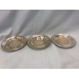 A set of three Mexican silver coasters,