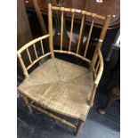 An arts and crafts elbow chair