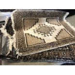 A pair of Persian handmaid rugs