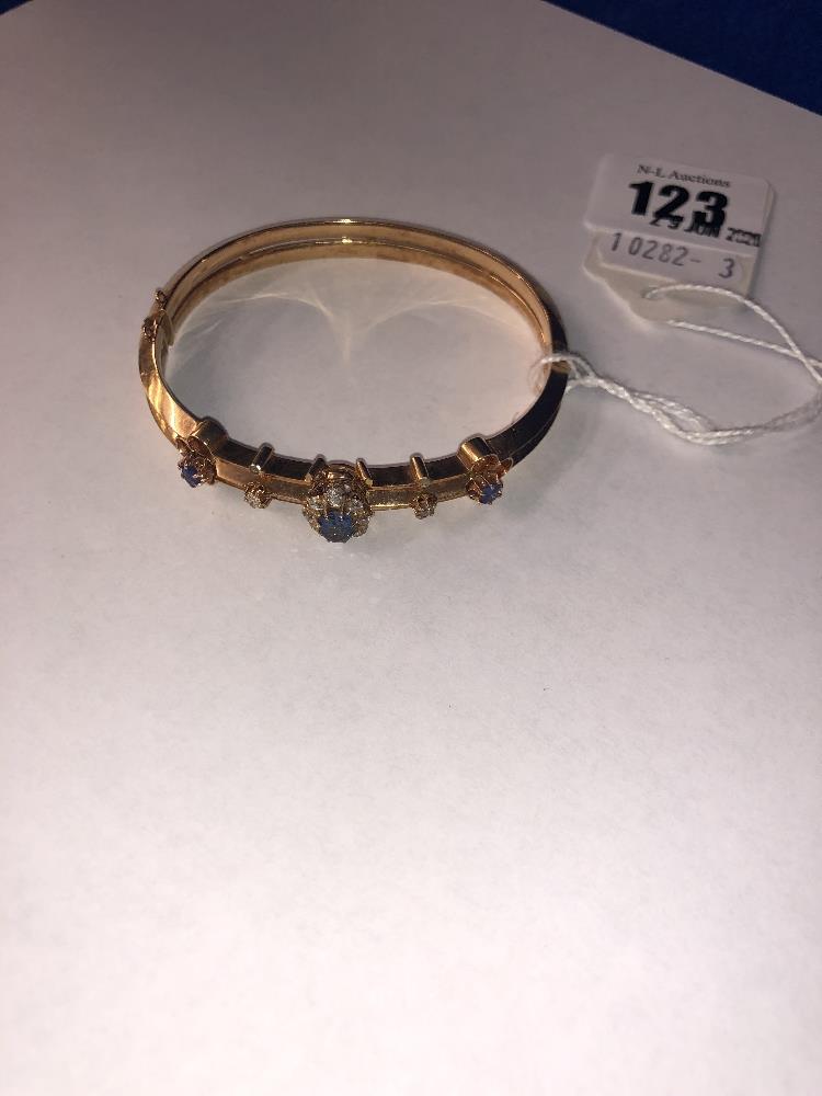 A 15ct gold ladies bangle set with sapphires and diamonds, - Image 2 of 2