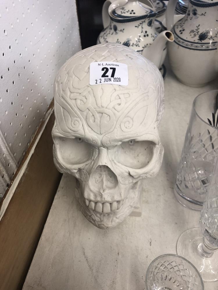 A figure of a skull