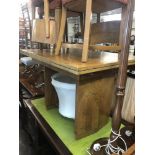 A walnut draw leaf table and six chairs